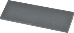 Norton - 4-1/2" Long x 1-3/4" Diam x 1/2" Thick, Silicon Carbide Sharpening Stone - Round, Fine Grade - Exact Tooling