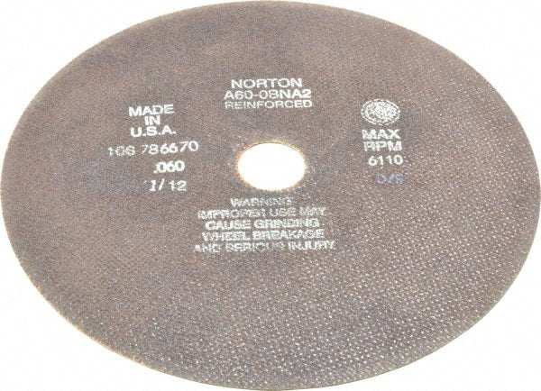 Norton - 10" 60 Grit Aluminum Oxide Cutoff Wheel - 0.06" Thick, 1-1/4" Arbor, 6,110 Max RPM, Use with Stationary Grinders - Exact Tooling