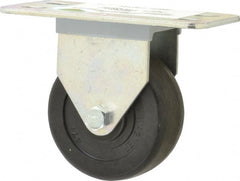 E.R. Wagner - 3" Diam x 1-1/4" Wide x 3-3/4" OAH Top Plate Mount Rigid Caster - Hard Rubber, 210 Lb Capacity, Delrin Bearing, 2-1/2 x 5" Plate - Exact Tooling