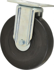 E.R. Wagner - 6" Diam x 1-3/8" Wide x 7-1/16" OAH Top Plate Mount Rigid Caster - Soft Rubber, 280 Lb Capacity, Delrin Bearing, 3-1/8 x 4-1/8" Plate - Exact Tooling
