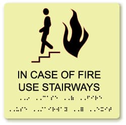 NMC - In Case of Fire - Use Stairway, Plastic Fire Sign - 8" Wide x 8" High, English/Braille, Glow-in-the-Dark - Exact Tooling