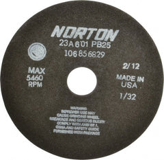 Norton - 7" 60 Grit Aluminum Oxide Cutoff Wheel - 1/32" Thick, 1-1/4" Arbor, 5,460 Max RPM, Use with Stationary Grinders - Exact Tooling