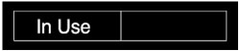 NMC - In Use/Vacant, 10" Wide x 2" High, Plastic Sign - English, White on Black, Wall Mount - Exact Tooling