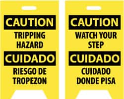 NMC - Caution - Tripping Hazard, Caution - Watch Your Step, 12" Wide x 19" High, Plastic Floor Sign - English/Spanish, A-Frame, Black on Yellow, For Accident Prevention - Exact Tooling