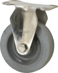 Albion - 4" Diam x 1-1/4" Wide x 5-1/8" OAH Top Plate Mount Rigid Caster - Soft Rubber, 410 Lb Capacity, Delrin Bearing, 2-1/2 x 3-5/8" Plate - Exact Tooling