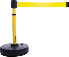 Banner Stakes - 22 to 42" High, 2-3/8" Pole Diam, Barrier Post Base & Stanchion - 9" Base Diam, Round Nylon Base, Yellow Plastic Post, 15' x 2-1/2" Tape, For Outdoor Use - Exact Tooling