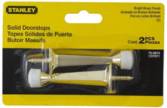 Stanley - 3" Projection Solid Door Stop - Wall Mount, Antique Brass Finish - Exact Tooling