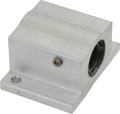 Thomson Industries - 3/8" Inside Diam, 100/200 Lbs. Dynamic Capacity, Closed Single Pillow Block Linear Bearing - 0.94" Overall Height x 1-3/4" Overall Width - Exact Tooling