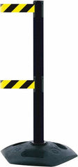 Tensator - 38" High, 2-1/2" Pole Diam, 4 Way Stanchion - 19" Base Diam, Octagon Recycled Rubber Base, Black Plastic Post, 13' x 2" Tape, Dual Line Tape, For Outdoor Use - Exact Tooling