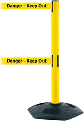 Tensator - 38" High, 2-1/2" Pole Diam, 4 Way Stanchion - 19" Base Diam, Octagon Recycled Rubber Base, Yellow Plastic Post, 13' x 2" Tape, Dual Line Tape, For Outdoor Use - Exact Tooling