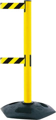 Tensator - 38" High, 2-1/2" Pole Diam, 4 Way Stanchion - 19" Base Diam, Octagon Recycled Rubber Base, Yellow Plastic Post, 13' x 2" Tape, Dual Line Tape, For Outdoor Use - Exact Tooling