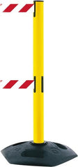 Tensator - 38" High, 2-1/2" Pole Diam, 4 Way Stanchion - 19" Base Diam, Octagon Recycled Rubber Base, Yellow Plastic Post, 13' x 2" Tape, Dual Line Tape, For Outdoor Use - Exact Tooling