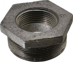 Made in USA - Size 2 x 1-1/4", Class 150, Malleable Iron Black Pipe Hex Bushing - 150 psi, Threaded End Connection - Exact Tooling