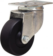 Hamilton - 3-1/2" Diam x 1-1/4" Wide x 4-13/16" OAH Top Plate Mount Swivel Caster - Hard Rubber, 140 Lb Capacity, Self-Lubricating Bearing, 2-1/2 x 3-3/4" Plate - Exact Tooling