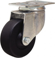 Hamilton - 3-1/2" Diam x 1-1/4" Wide x 4-13/16" OAH Top Plate Mount Swivel Caster - Hard Rubber, 225 Lb Capacity, Self-Lubricating Bearing, 2-1/2 x 3-3/4" Plate - Exact Tooling
