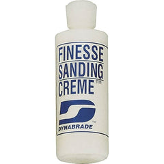 Dynabrade - 4 oz Sanding Creme Compound - Compound Grade Fine, White, For High Glossing, Use on Composites, Fiberglass & Metal - Exact Tooling