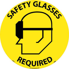 NMC - Adhesive Backed Floor Signs; Message Type: Accident Prevention ; Graphic Type: Head w/ Safety Glasses ; Message or Graphic: Message & Graphic ; Legend: Safety Glasses Required ; Color: Black; Yellow ; Special Color Properties: No Special Properties - Exact Tooling