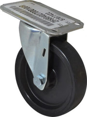 E.R. Wagner - 4" Diam x 1" Wide x 4-13/16" OAH Top Plate Mount Swivel Caster - Polyolefin, 140 Lb Capacity, Plain Bearing, 2-3/4 x 3-3/4" Plate - Exact Tooling
