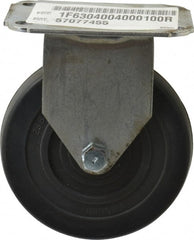E.R. Wagner - 4" Diam x 1" Wide x 4-13/16" OAH Top Plate Mount Rigid Caster - Soft Rubber, 115 Lb Capacity, Delrin Bearing, 2-3/4 x 3-3/4" Plate - Exact Tooling