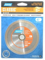 Norton - 4-1/2" Diam, 5/8 & 7/8" Arbor Hole Diam, Wet & Dry Cut Saw Blade - Diamond-Tipped, Standard Round Arbor - Exact Tooling