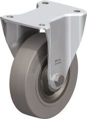 Blickle - 6-1/2" Diam x 1-31/32" Wide x 7-61/64" OAH Top Plate Mount Rigid Caster - Solid Rubber, 990 Lb Capacity, Ball Bearing, 5-1/2 x 4-3/8" Plate - Exact Tooling