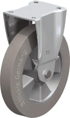 Blickle - 10" Diam x 1-31/32" Wide x 11-39/64" OAH Top Plate Mount Rigid Caster - Solid Rubber, 1,430 Lb Capacity, Ball Bearing, 5-1/2 x 4-3/8" Plate - Exact Tooling
