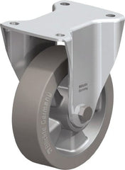 Blickle - 6-1/2" Diam x 1-31/32" Wide x 7-61/64" OAH Top Plate Mount Rigid Caster - Solid Rubber, 880 Lb Capacity, Ball Bearing, 5-1/2 x 4-3/8" Plate - Exact Tooling