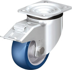 Blickle - 4" Diam x 1-37/64" Wide x 5-7/64" OAH Top Plate Mount Swivel Caster with Brake - Polyurethane-Elastomer Blickle Besthane, 660 Lb Capacity, Ball Bearing, 3-15/16 x 3-3/8" Plate - Exact Tooling