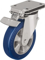 Blickle - 6-1/2" Diam x 1-31/32" Wide x 5-25/32" OAH Top Plate Mount Swivel Caster with Brake - Polyurethane-Elastomer Blickle Besthane, 1,210 Lb Capacity, Ball Bearing, 5-1/2 x 4-3/8" Plate - Exact Tooling