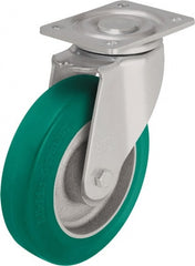 Blickle - 6-1/2" Diam x 1-31/32" Wide x 7-61/64" OAH Top Plate Mount Swivel Caster - Polyurethane-Elastomer Blickle Softhane, 1,320 Lb Capacity, Ball Bearing, 5-1/2 x 4-3/8" Plate - Exact Tooling