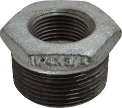 B&K Mueller - Class 150, 1-1/4 x 3/4" Galvanized Pipe Hex Bushing - Threaded, Malleable Iron - Exact Tooling