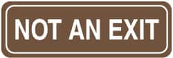 NMC - Not an Exit, 11" Wide, Acrylic Sign - English, Brown on White, Wall Mount - Exact Tooling