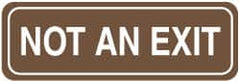 NMC - Not an Exit, 11" Wide, Acrylic Sign - English, Brown on White, Wall Mount - Exact Tooling