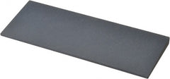 Norton - 4-1/2" Long x 1-3/4" Diam x 1/4" Thick, Silicon Carbide Sharpening Stone - Round, Fine Grade - Exact Tooling