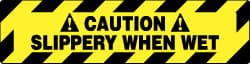 NMC - Caution - Slippery When Wet, Anti-Skid Pressure-Sensitive Vinyl Floor Sign - Rectangle, Black on Yellow, Adhesive Backed, For Accident Prevention - Exact Tooling