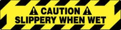 NMC - Caution - Slippery When Wet, Anti-Skid Pressure-Sensitive Vinyl Floor Sign - Rectangle, Black on Yellow, Adhesive Backed, For Accident Prevention - Exact Tooling
