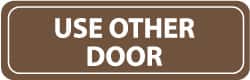 NMC - Use Other Door, 11" Wide x 3.5" High, Acrylic Sign - English, White on Brown, Wall Mount - Exact Tooling