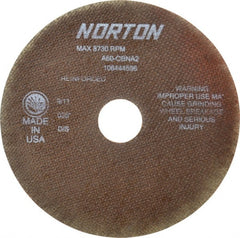 Norton - 7" 60 Grit Aluminum Oxide Cutoff Wheel - 0.035" Thick, 1-1/4" Arbor, 8,730 Max RPM, Use with Stationary Grinders - Exact Tooling