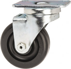 Albion - 3-1/2" Diam x 1-1/4" Wide x 4-11/16" OAH Top Plate Mount Swivel Caster - Polyolefin, 300 Lb Capacity, Delrin Bearing, 2-1/2 x 3-5/8" Plate - Exact Tooling